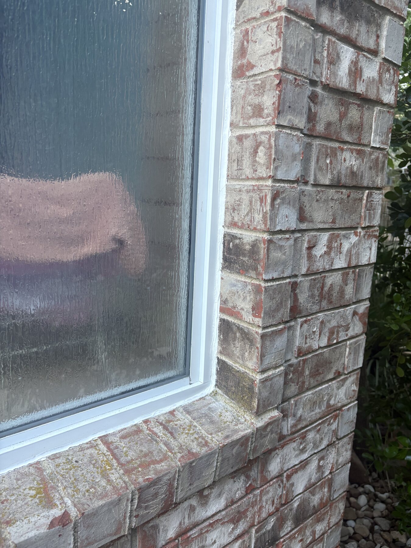 After photo of a Georgetown brick window corner with fresh sealant