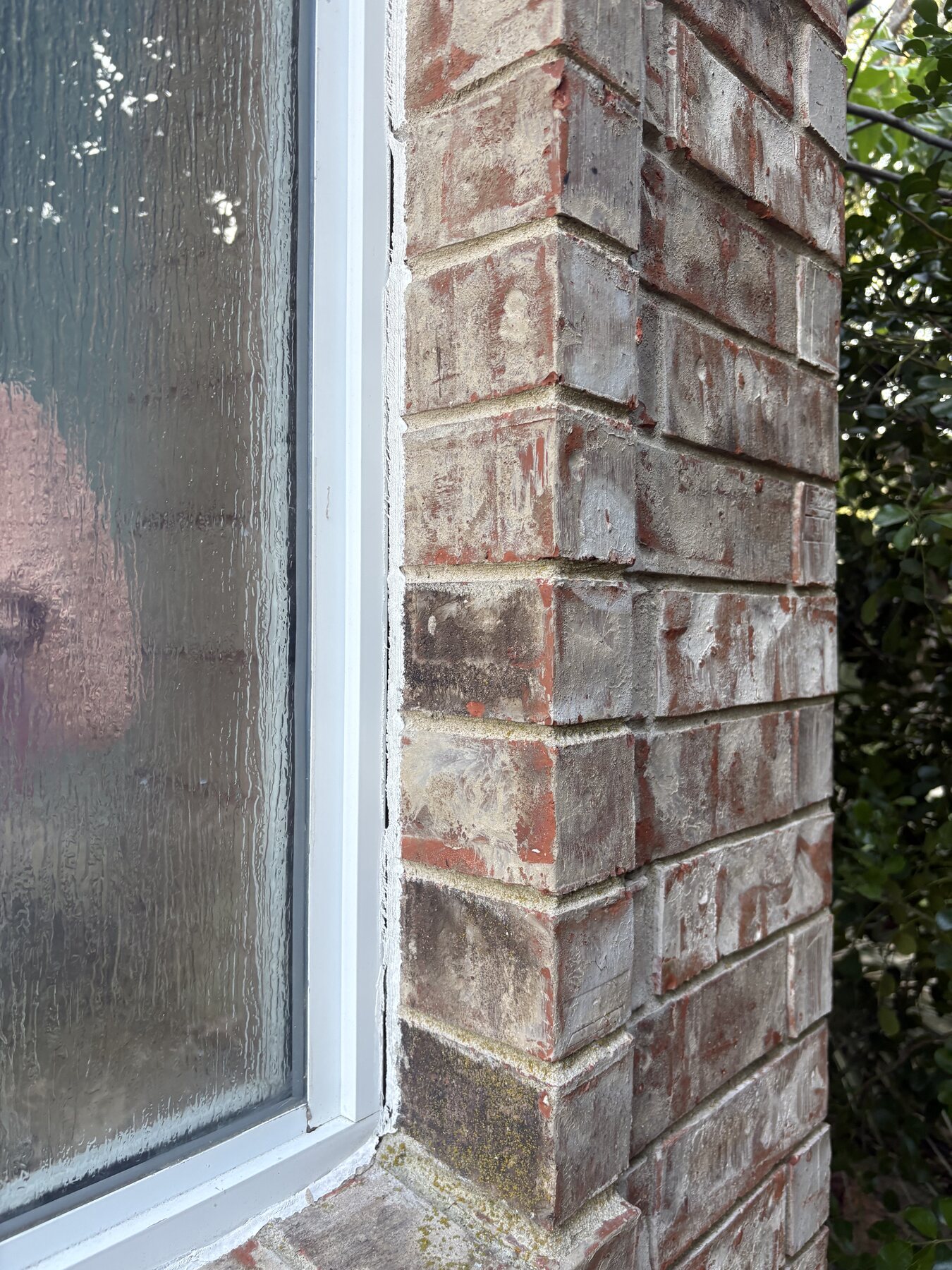 Before photo of a Georgetown brick window corner